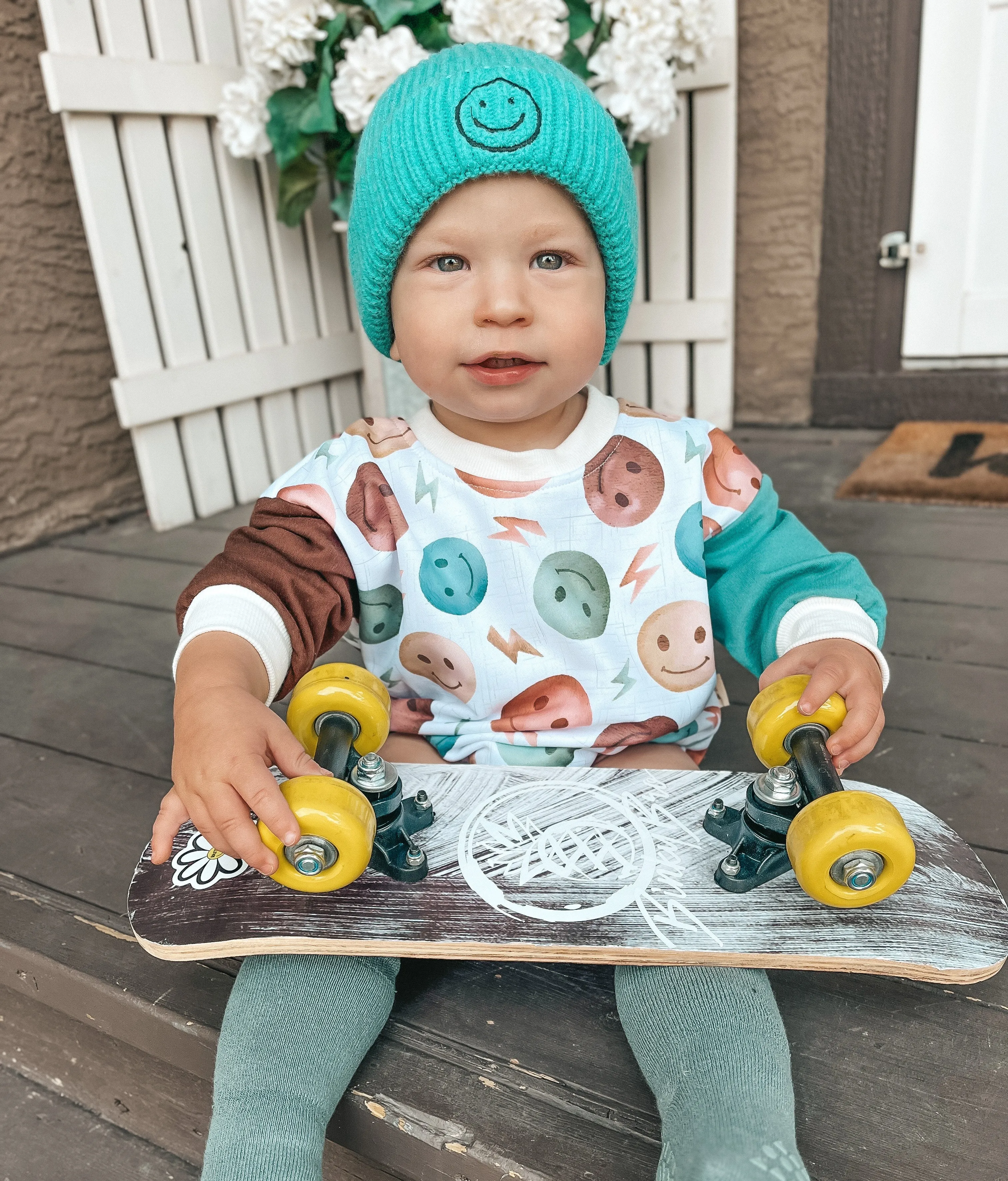 Theo & Me - Green Aqua Smiley Faces Ribbed Knit Hat